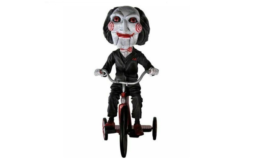 ΦΙΓΟΥΡΑ 18CM HEAD KNOCKER PUPPET ON BICYCLE (SAW)
