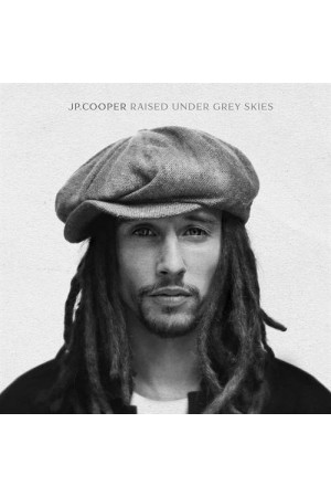 RAISED UNDER GREY SKIES